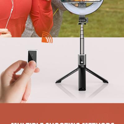 China MEASURING Wireless Selfie Stick Tripod with Built-in Invisible Tripod 6 Inch Round Fill Light for Indoor and Outdoor Short Video Shooting for sale