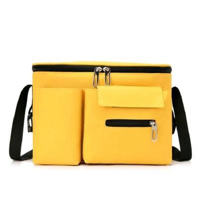 China Yellow Water Resistant Diaper Bags Can Be Used In Baby Stroller Oxford Diaper Mum Handy Wear Resistant One Shoulder Bag for sale