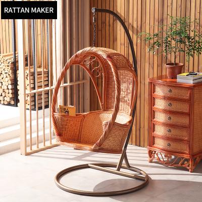 China Contemporary adult red rattan wicker basket swing egg haning chair with iron stand for sale