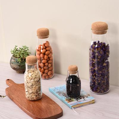 China Sustainable glass material and eco-friendly feature borosilicate glass storage jar with bamboo wooden press lid for sale