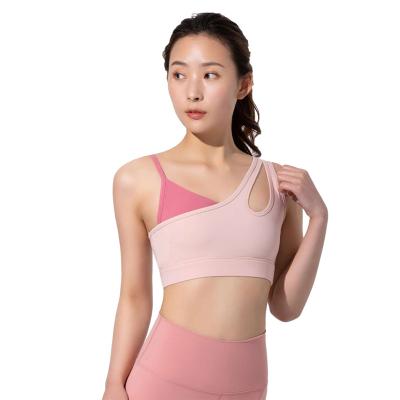 China 2022 Detachable Sports Underwear Pump Bra Two Piece Contrast Color Splicing Hollow Vest Women's Yoga Outlet Fitness Bra for sale