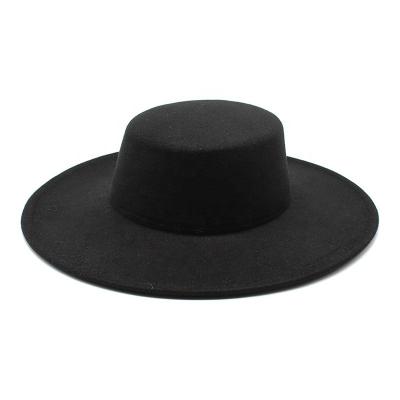 China 2022 Wholesale custom logo vintage character brand felt hat men woman solid color brim felt hat classic wide hat for sale