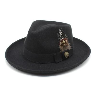 China Wholesale Fashion Character Fashion Vintage Wide Brim Fedora Hat With Feather Hat Stiff Wide Band For Mens Womens Jazz Cap Unisex Solid Color for sale