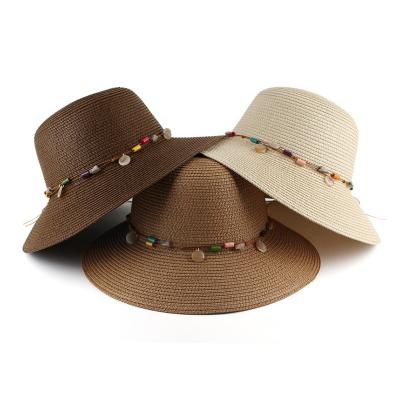 China Barred 2022 Sombrero Wholesale Stone Belt Straw Hat Summer Holiday Beach Sunscreen Leisure Decorative Paper Straw Bucket Hats For Women for sale