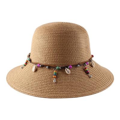 China 2022 Summer Wholesale High Quality Paper Striped Straw Hats With Shell Band Decorative Sunscreen Sun Bucket Straw Hats For Women Men for sale