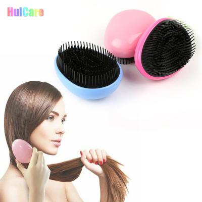 China Custom Logo Home Hair Care Comb Massage Scalp Massage Hair Brush Tangle Hair Brush Egg Shaped Detangling Hair Brush for sale