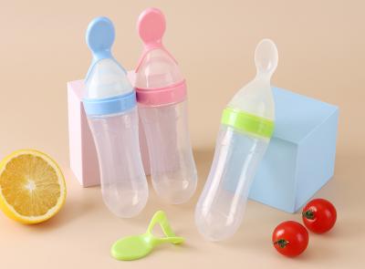 China Silicone Squeeze Bottle Spoon Toddler Baby Food Dispensing Spoon Rice Paste Squeeze Feeder Baby Bottle With Spoon for sale