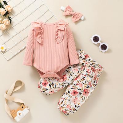 China Sale Casual Style Solid Color Rompers Breathable Warm Light Pink Ribbed Baby Clothing Set With Floral Pants for sale