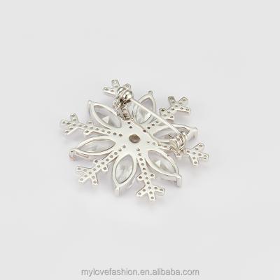 China Fashionable Stylish Cubic Diamond Snowflake Zircon Design Synthetic CZ Christmas Soft Brooch Brooch For Clothing Decoration for sale