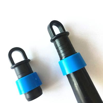 China Eco-Friendly Drip Irrigation Fittings Agriculture Drip Tape Connector Plastic Lock Ring End Plug Coupling for sale