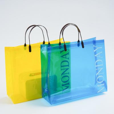 China High Quality Eco Plastic Cosmetic Apparel PVC Frosted Tote Bag Gift Bag Clear PVC Shopping Bag Custom Logo Printing for sale