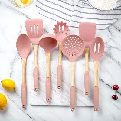 China Sustainable Nonstick Soft Silicone Covered Wooden Handle Silicone Kitchen Utensils Set Cooking Tools for sale