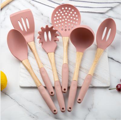 China 7 Pcs Food Grade Sustainable Reusable Silicone Cocina Set Wood To Handle Non Stick Kitchen Utensil for sale