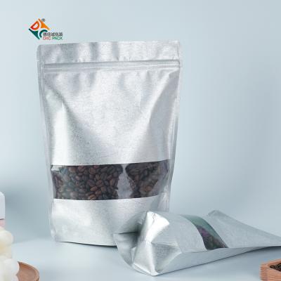 China Barrier DXC 500g Kraft Paper Stand Up Pouch With Transparent Window And Zipper for sale