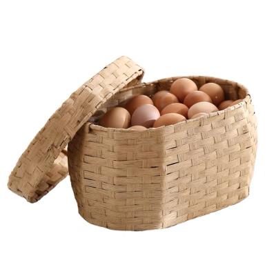 China Sustainable Handwoven Style Plastic Rattan Flower Basket Egg Basket Rural Straw Basket for sale