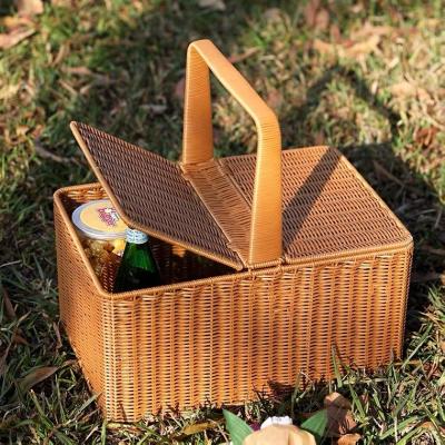 China Handles Wholesale New Style Custom Design PP High Quality Handmade Rattan Picnic Handle Basket for sale