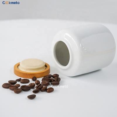 China Sustainable High End Ceramic White Storage Jar With Wooden Bamboo Lid Ceramic Coffee And Tea Set for sale