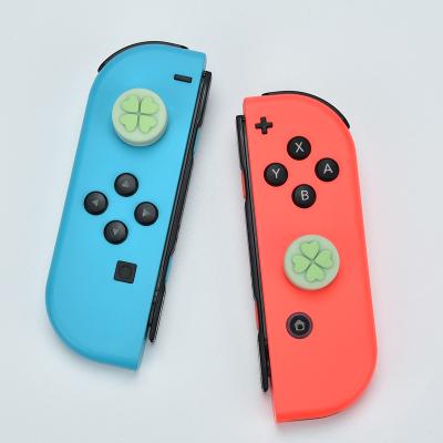 China Antiskid and Sweatproof For Nintendo Thumb Grips Joystick Cover Silicone Gamepad Covers Cartoon Design Switch Caps for sale