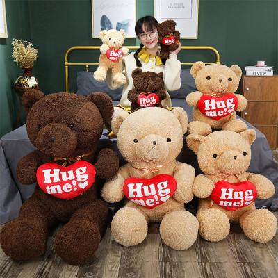 China Cute Custom Logo Plush Toy Bears Brown Teddy Bear Pictures With Heart for sale