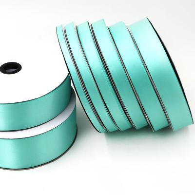 China Durable 100% Polyester Satin Ribbon 57mm Double Face Ribbon Wide Satin for sale