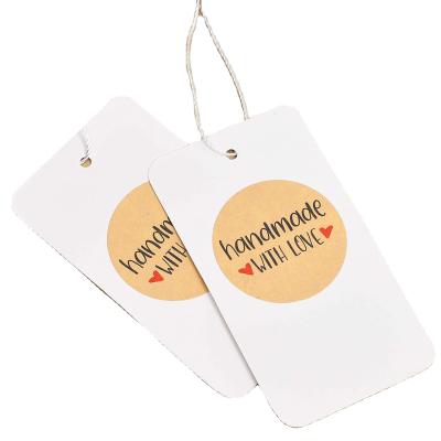 China Materials Printing Paper Clothing Tags Recycled Custom Paper Hang Tag Clothing Paper Tag for sale