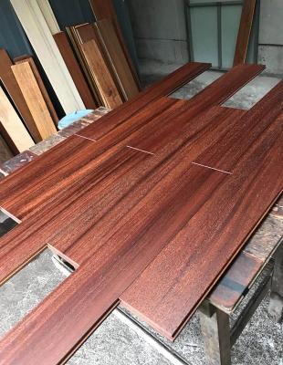 China Traditional Deep Brushed Reddish African Teak Solid Wood Flooring for sale