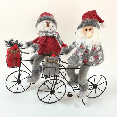 China Christmas Cute Santa Snowman Riding Bike Christmas Character Santaor Decoration for sale