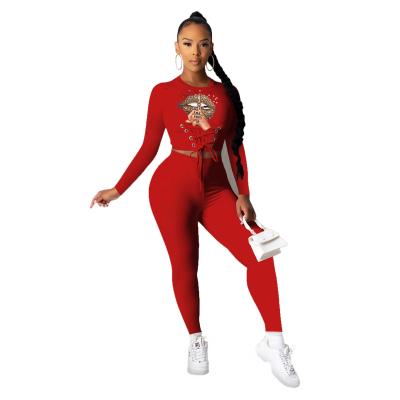 China Anti-Wrinkle Fashion Printed Women Long Sleeve Crop Top 2 Piece Set Lace Up Legging Set Women Autumn Skinny Set for sale