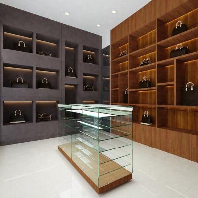 China Environmental friendly elegant design showcase cabinet handbag furniture store glass rack perfect for ladies shop and other commercial locations for sale