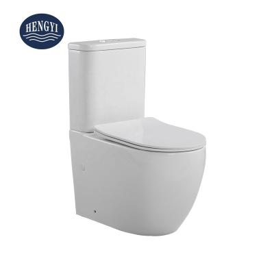 China Double-Flow Factory Standard Design Two-Piece Flush Rimless Two-Piece Bathroom WC High Quality European Ceramic Toilet en venta