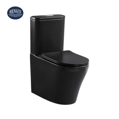 China Double-flow Matte Black Cyclone Flushing Two Piece Toilet Suites Relieve Waist Ware Sanitary Watermark en venta