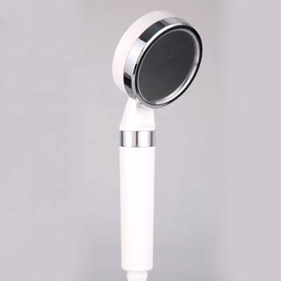 China Latest Design Handheld Bathroom Water Saving ABS Free Round Shower Head White for sale