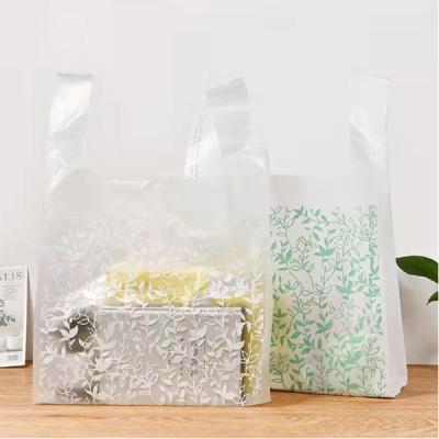 China BIODEGRADABLE T Shirt Bags For Supermarket Carry Plastic Biodegradable Eco - Friendly T Shirt Bag for sale