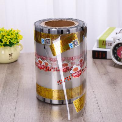 China Moisture Proof Custom Automatic Packaging Compound Color Snacks Cookies Cake Bread Food Grade Clear Transparent Plastic Mylar Roll Film For Milk for sale