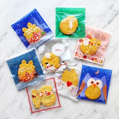 China Custom Self Adhesive Cute Cake Packaging Cute Cartoon Christmas Gift Birthday Christmas Barrier Seal Opp Plastic Bag With Logo for sale