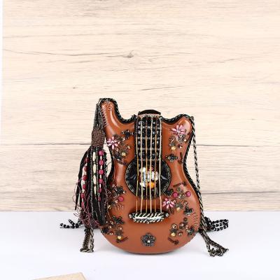 China luxury & special & Special High Quality Unique Shape Guitar Tassel Evening Clutches Style Angel Kiss Ukulele Luxury Cross - Body Bag Custom Logo PU Leather Bag for sale