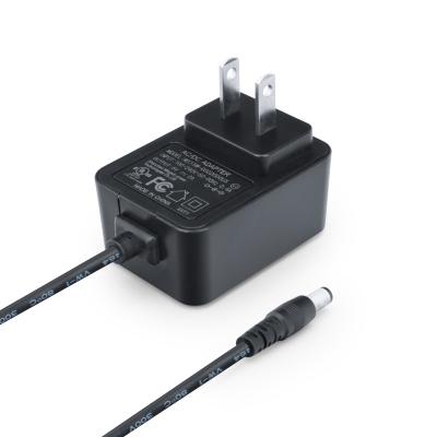 China ABS+PC Flame Retardant Material UL Listed Level VI Plug In AC DC 12V 1a Power Adapter 12v 1a DC Power Supply for sale