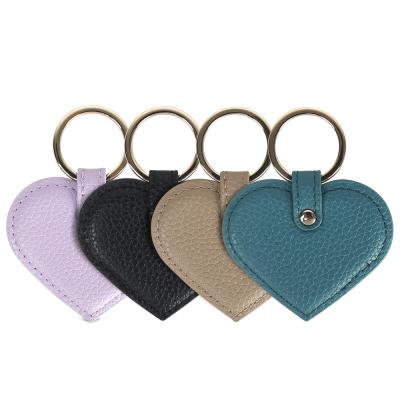 China Wholesale Custom Shaped Pure Leather Charm Heart Car Key Chain Goods Cute Key Chain Keychain For Girls And Women for sale