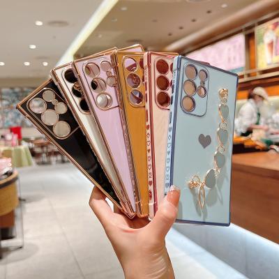 China Shockproof Fashion Plating Love Heart Wristband Chain Case For Samsung Galaxy S23 S22 S21Ultra Shockproof Case Cover With Lanyard for sale