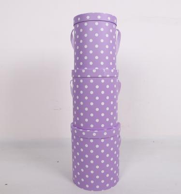 China Handmade Custom Round Cardboard Bouquet Flower Packaging Boxes With Polka Dot for sale