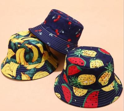 China Character Fruit Banana Pineapple Watermelon Lemon Printed Reversible Bucket Hats for sale