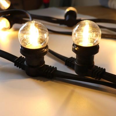 China Party lighting Connectable decorative lighting warm white LED globe bulbs flat rubber cable E27 belt light for sale