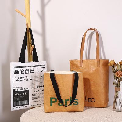 China Eco - Friendly Reusable Custom Printed Travel Shopping Cross - Waterproof Kneaded Composite Body Handbag Washed Dupont Paper Bag for sale