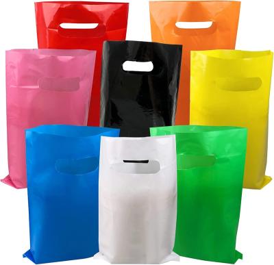 China Customized handheld colorful die cut colorful die cut plastic bag party candy gift strong and durable shopping grocery bag for sale