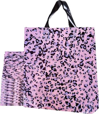 China Customized fashion shopping boutique retail party recyclable party gift with ring handle leopard print pe eco plastic bag for sale