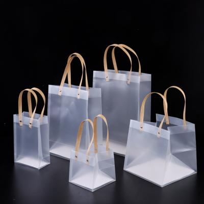 China Custom Printed Disposable Logo Holiday Shopping Clothes Gift Packaging Handbags PP Plastic Frosted Tote Bags for sale