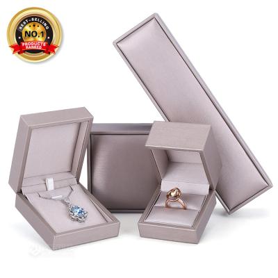 China Wholesale Luxury Dongguan Custom Gold Jewelry Packaging Display Logo Hard Case Printed PU Leather Wedding Bracelet Jewelry Packaging Necklace Ring Box for sale