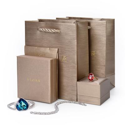 China Packaging Custom Jewelry Display OEM Odm Logo Ring Jewelry Gift Packaging Set With Bag for sale