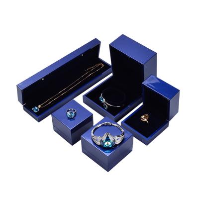 China High End Jewelry Packaging Display Varnish Ring Display Blue Light Led Jewelry Packaging Jewelry Box Set for sale