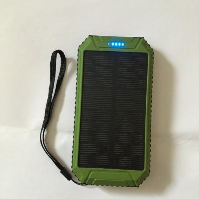 China Factory Price Waterproof 10000mAh Dual USB Green Housing Solar Charger With Light And Clamp For Mobile Phone for sale